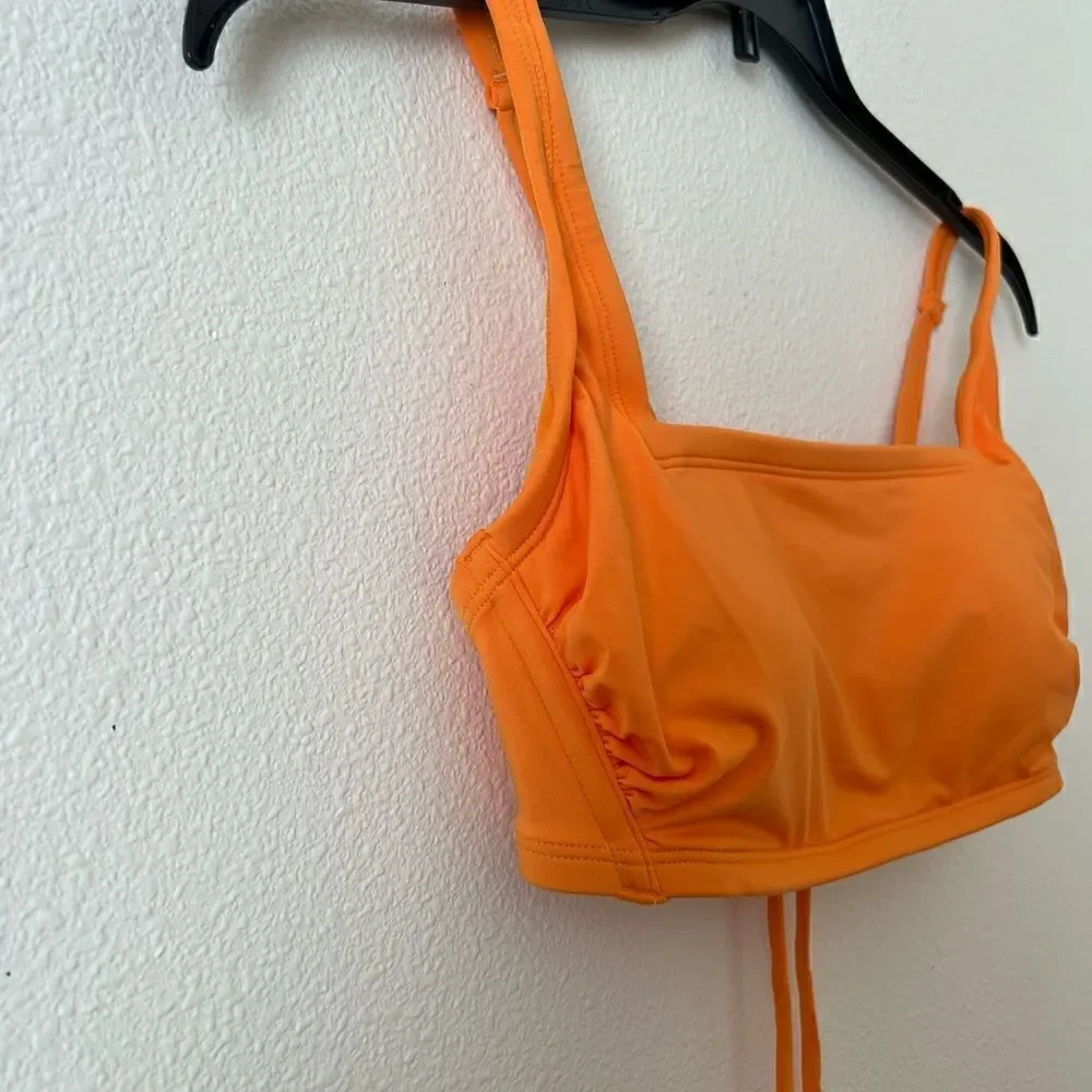 Kona Sol orange swimming top size D/DD
